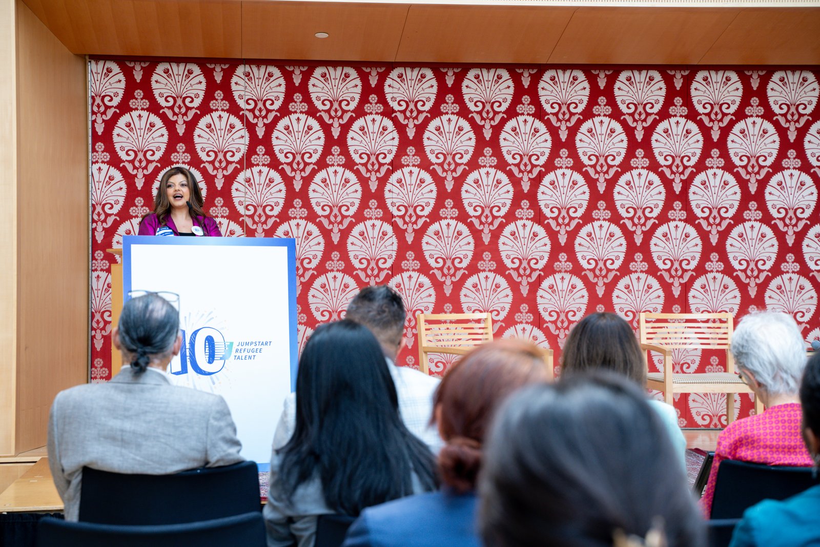 Mina Sharif delivering a keynote for Jumpstart Refugee Talent